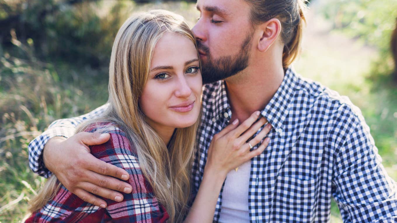 Type A woman being loved the right way by a man with a beard