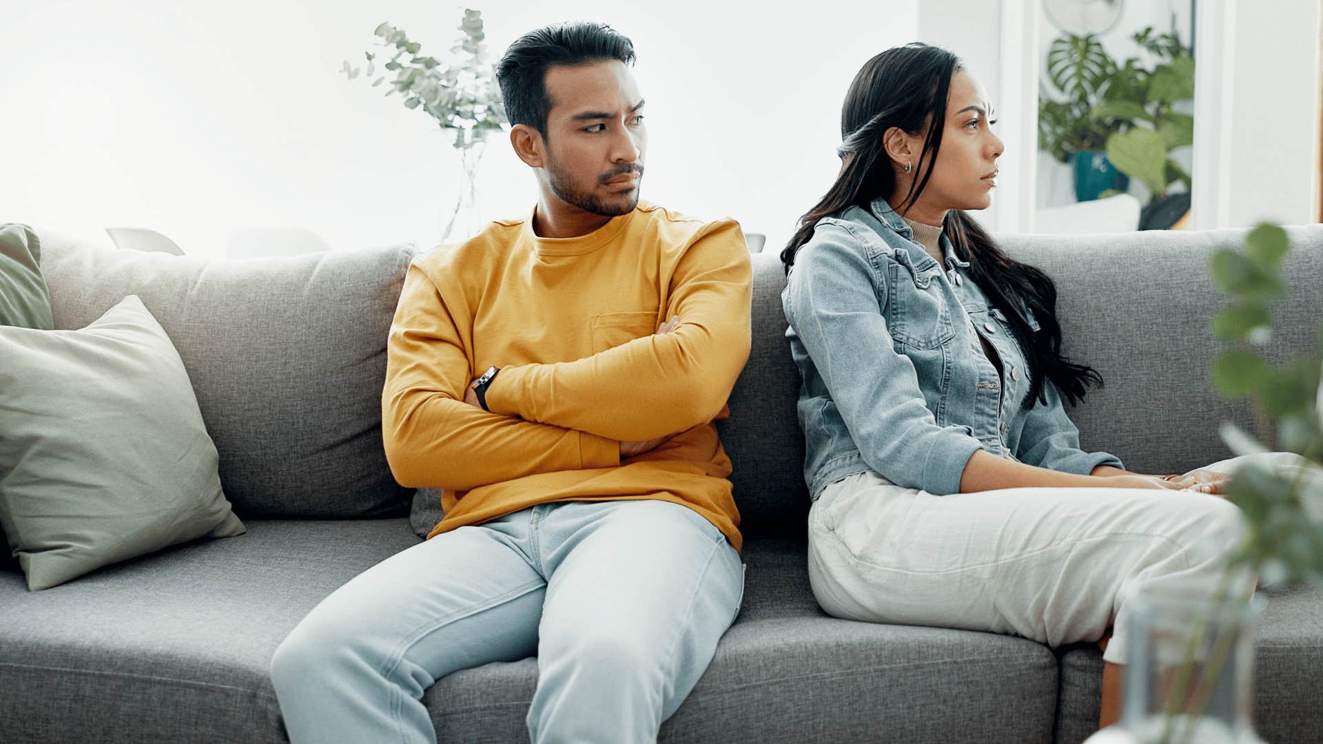 couple arguing on couch