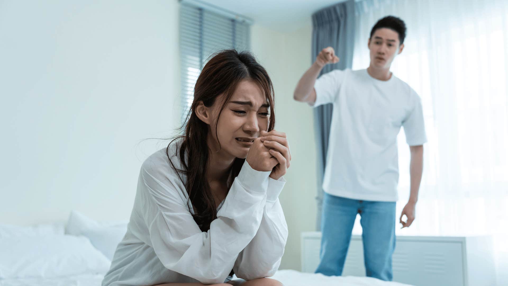 man yelling at woman