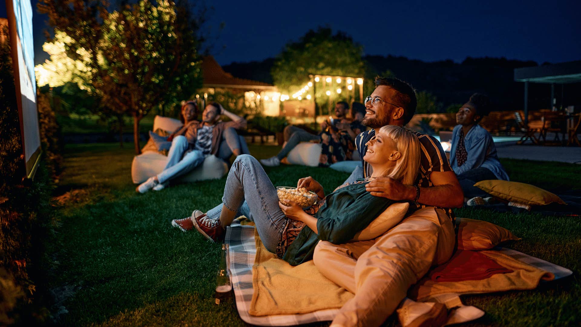 couple watching a movie outside