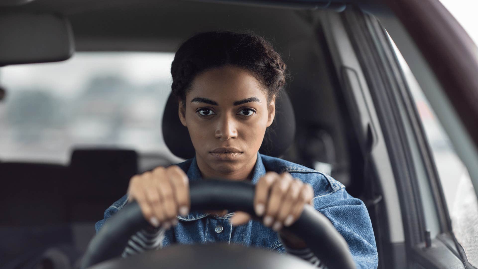 upset woman driving