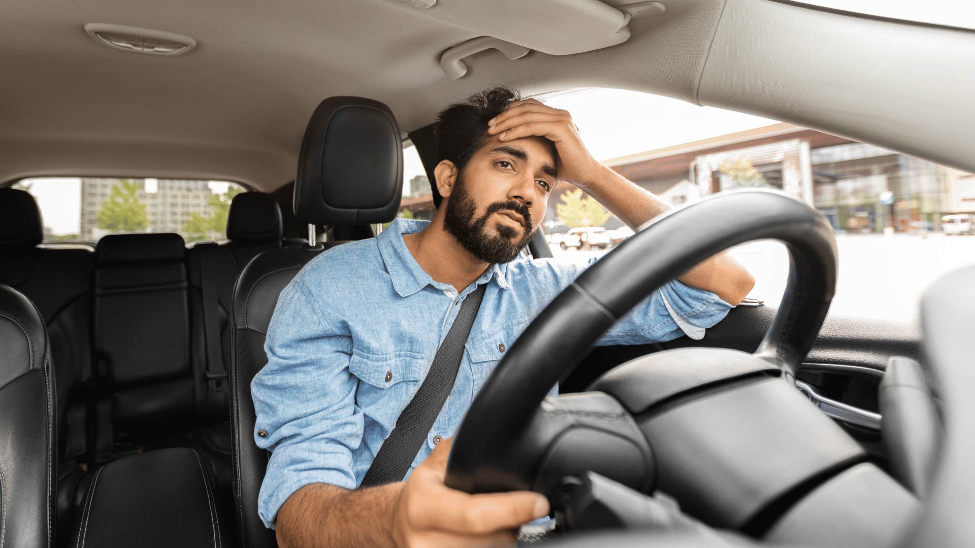 annoyed man in a car