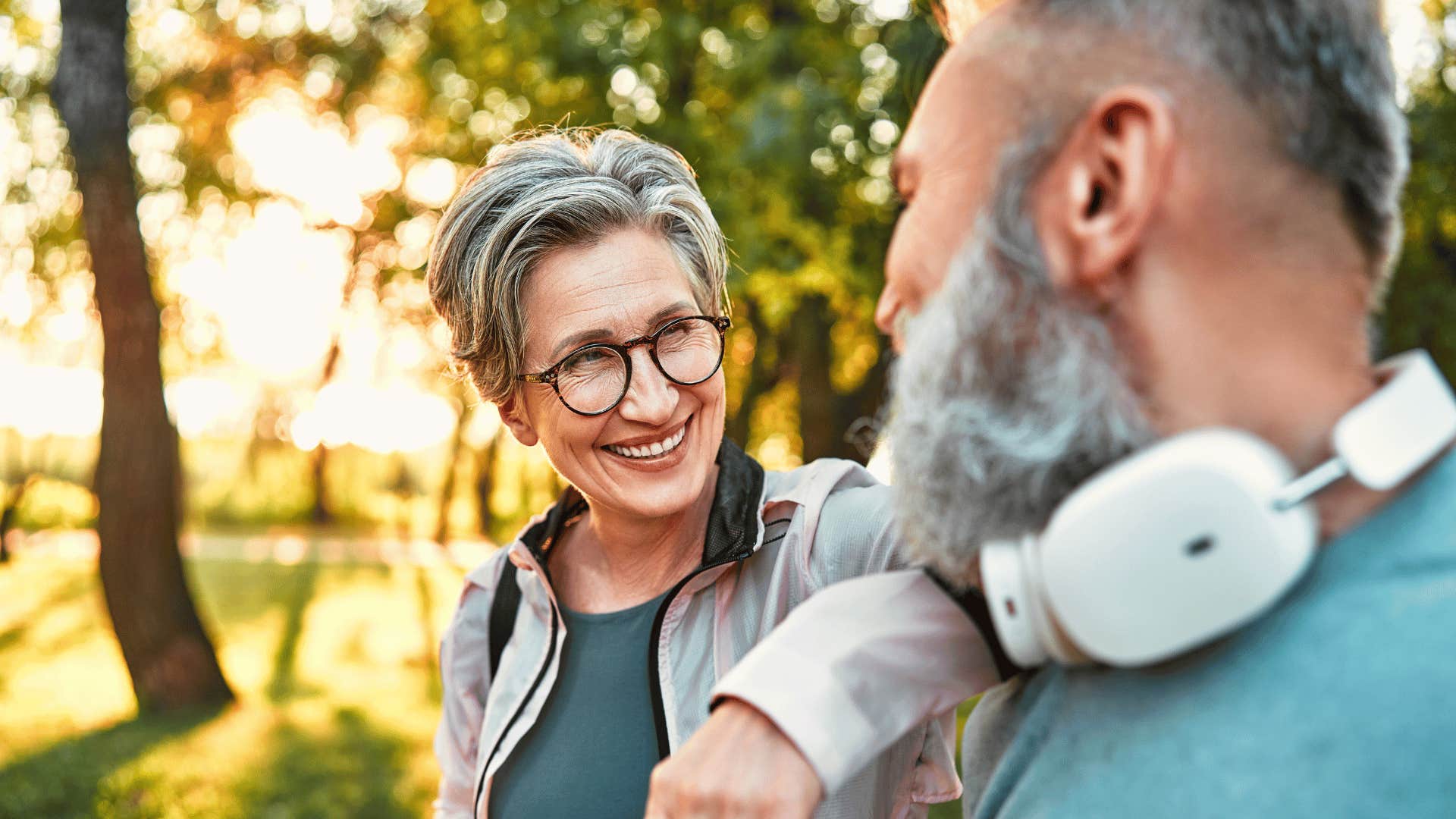 Couple on walk in nature take time to listen to each other