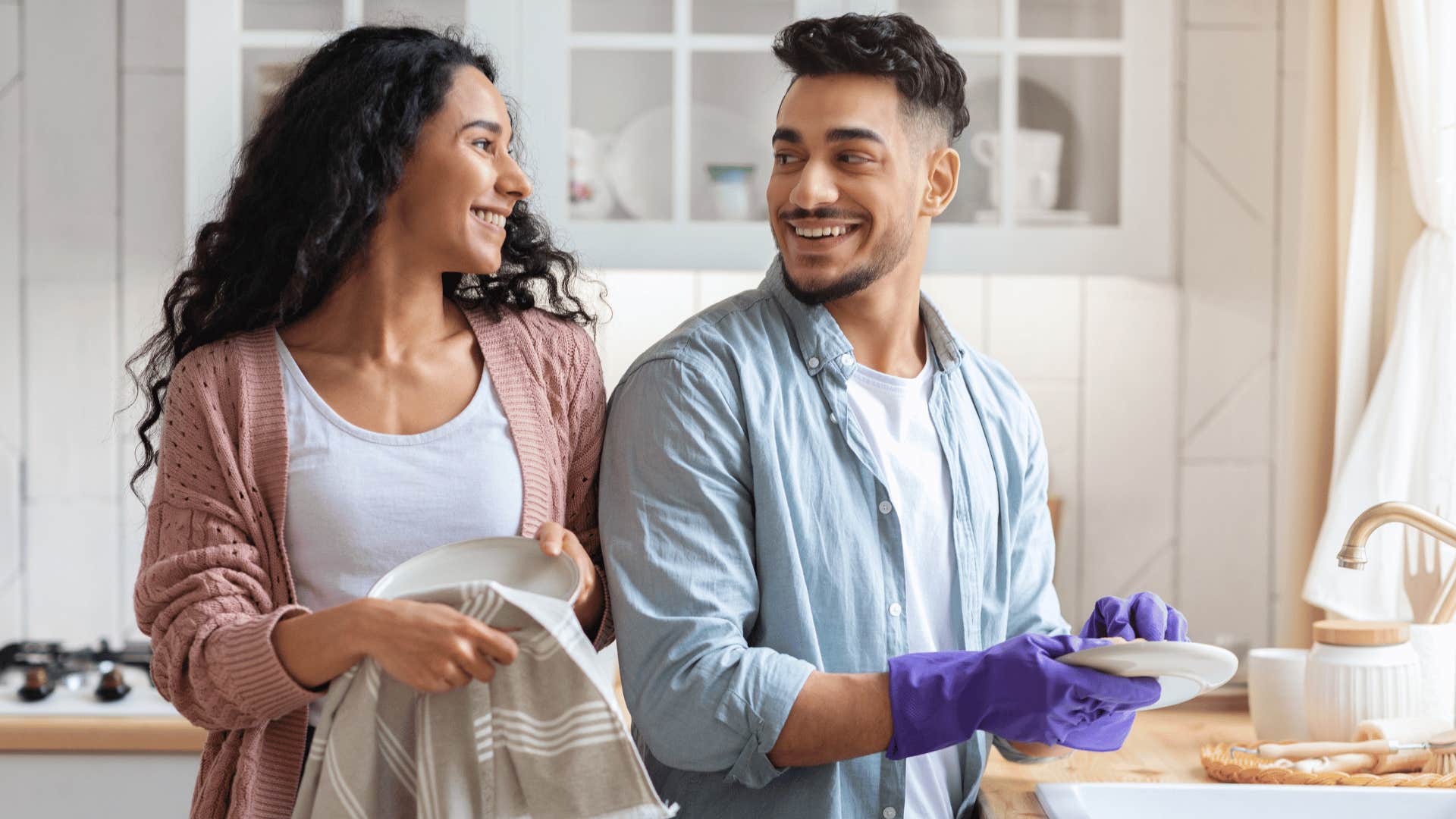 couple doing dishes 