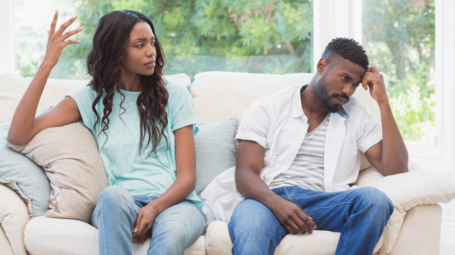 couple arguing on couch