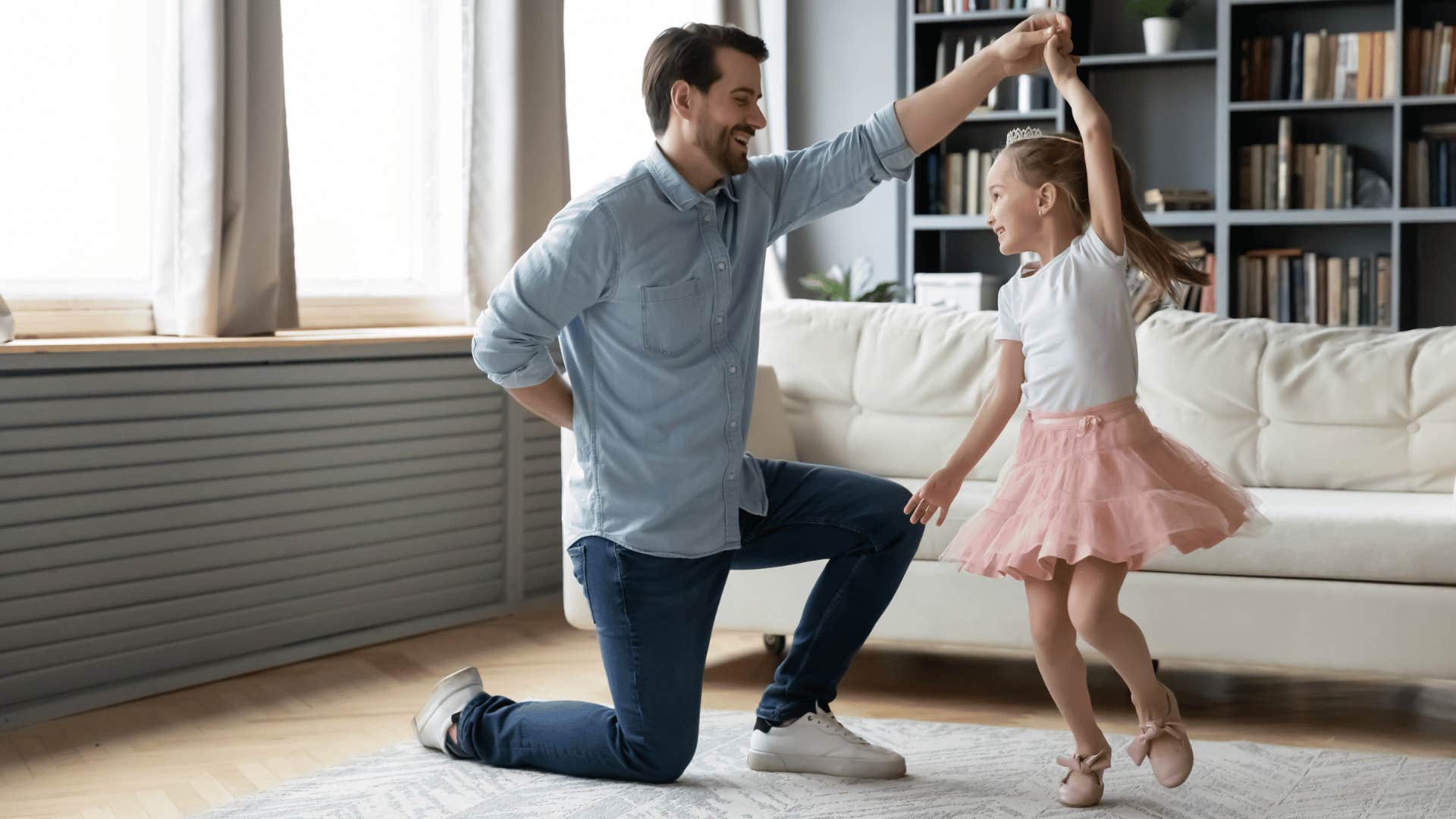 dad dancing with daughter