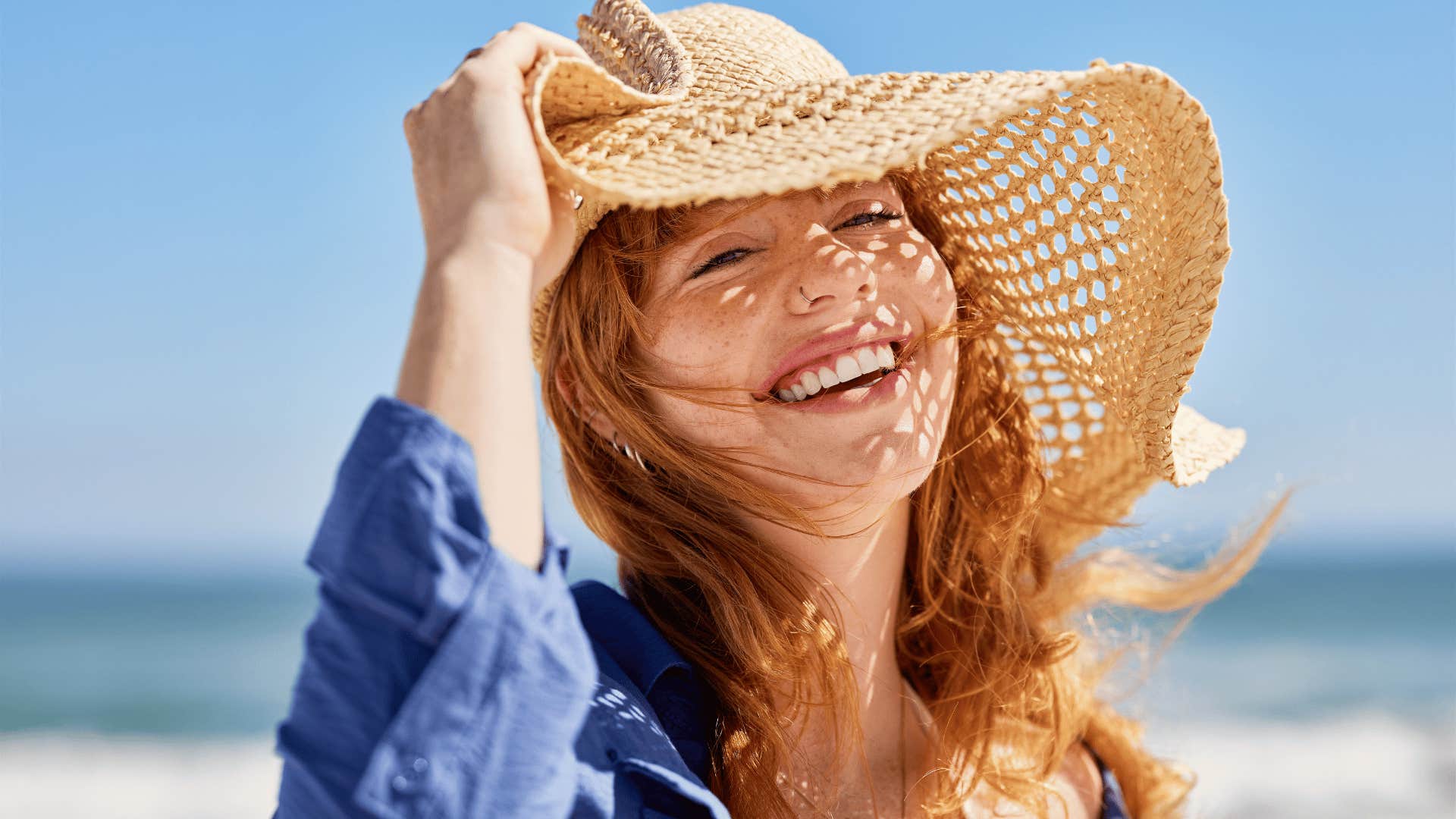 woman smiling on the beach