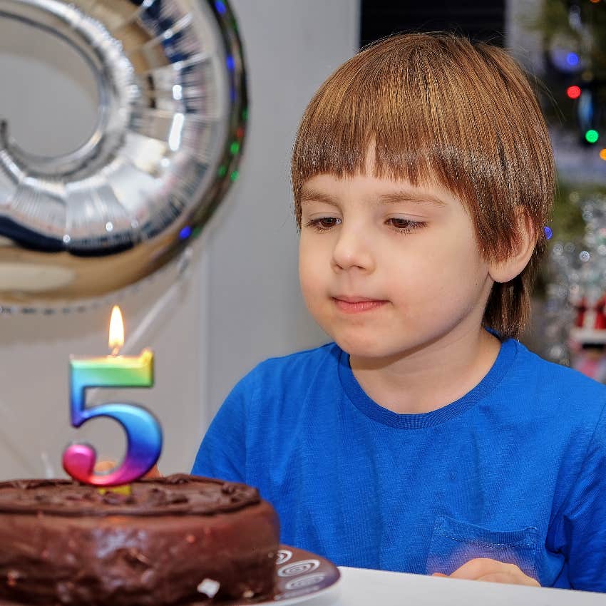 Birthday boy with chocolate cake