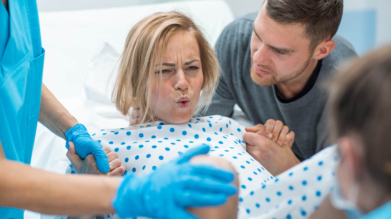 Daughter-in-law in delivery room giving birth