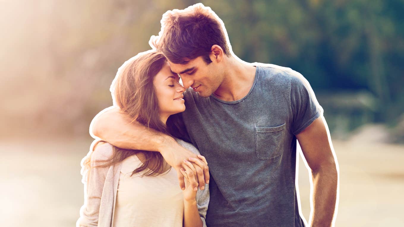 Couple in love, unaware of their brain changes, in a field