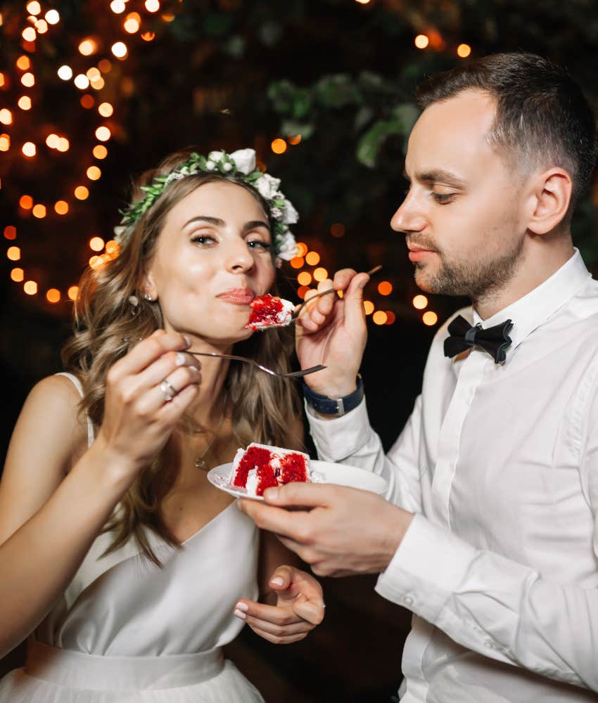 groom feeding bride vegan cake