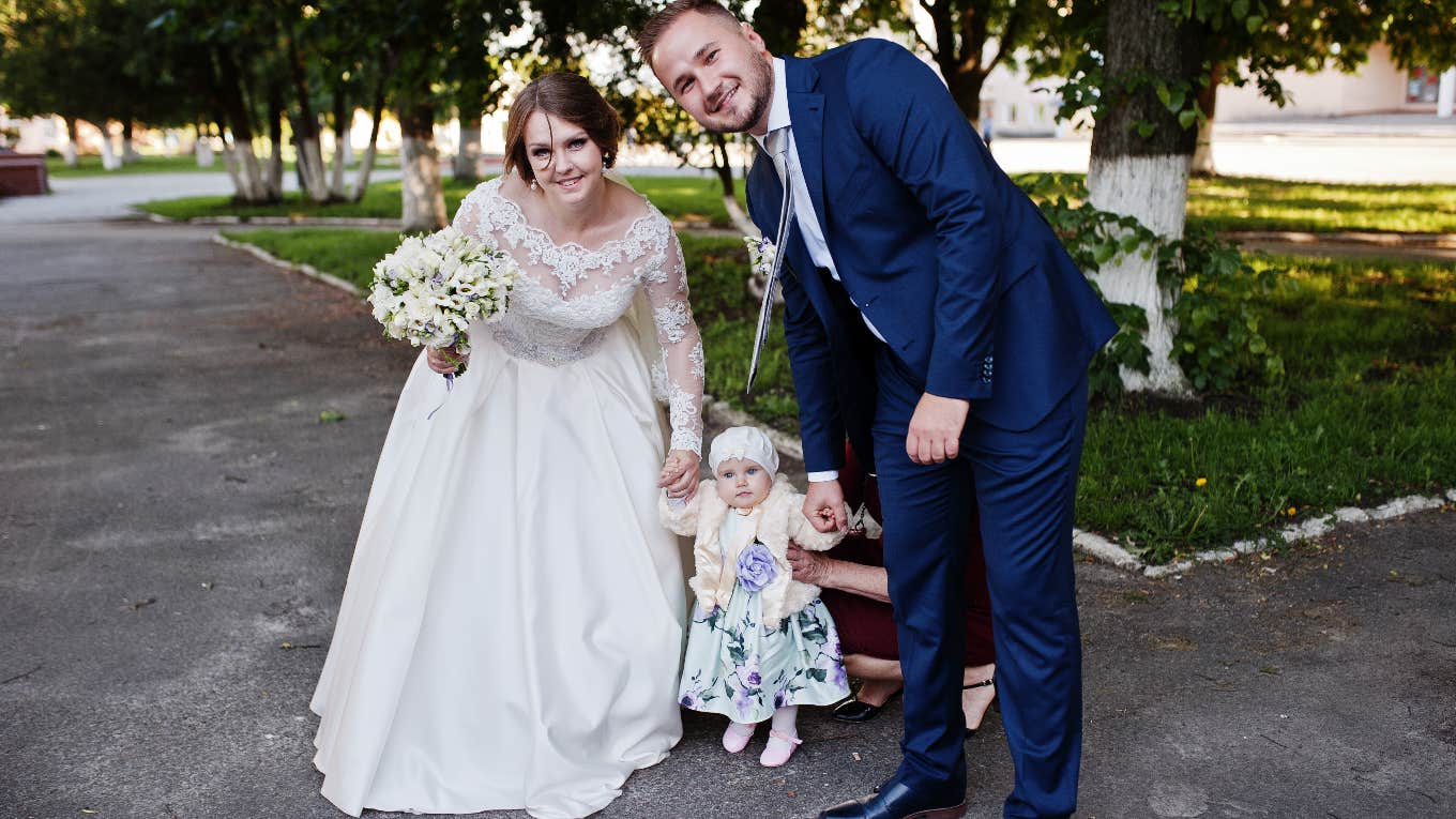 Bride and groom with their daughter