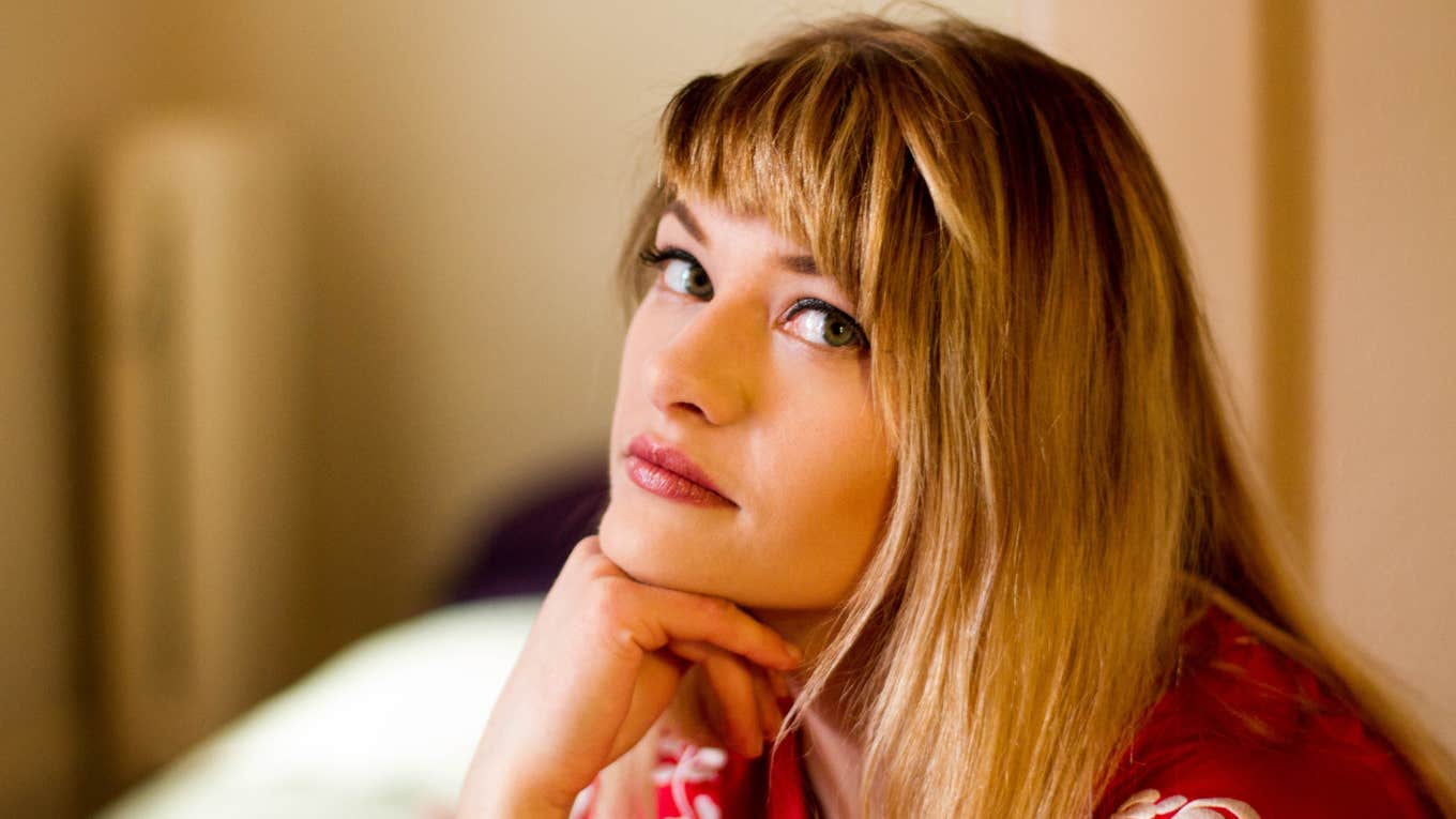 Pretty caucasian woman in red shirt