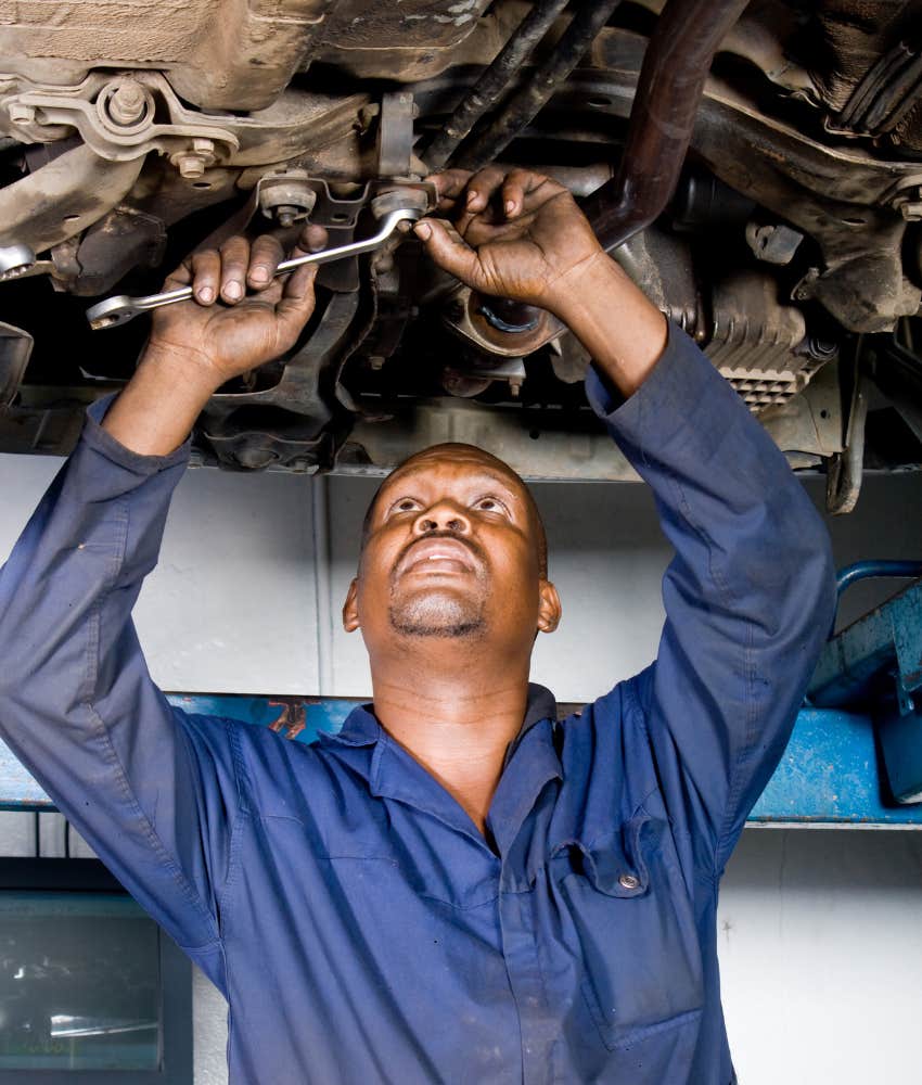 mechanic working on car