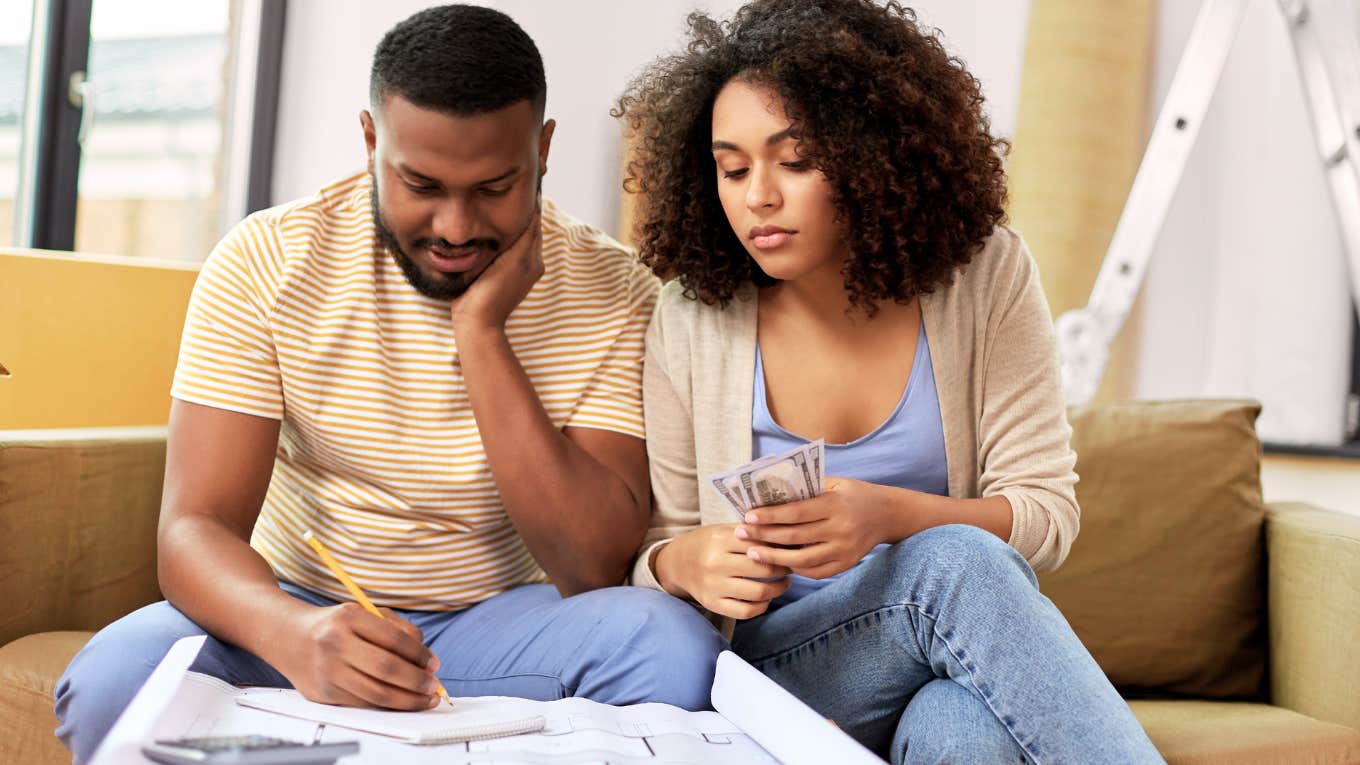 Couple looking at their finances together. 