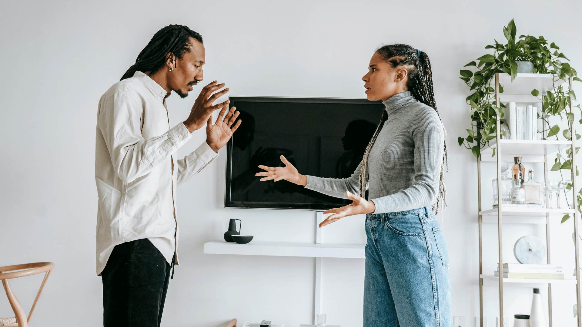 couple arguing in their living room