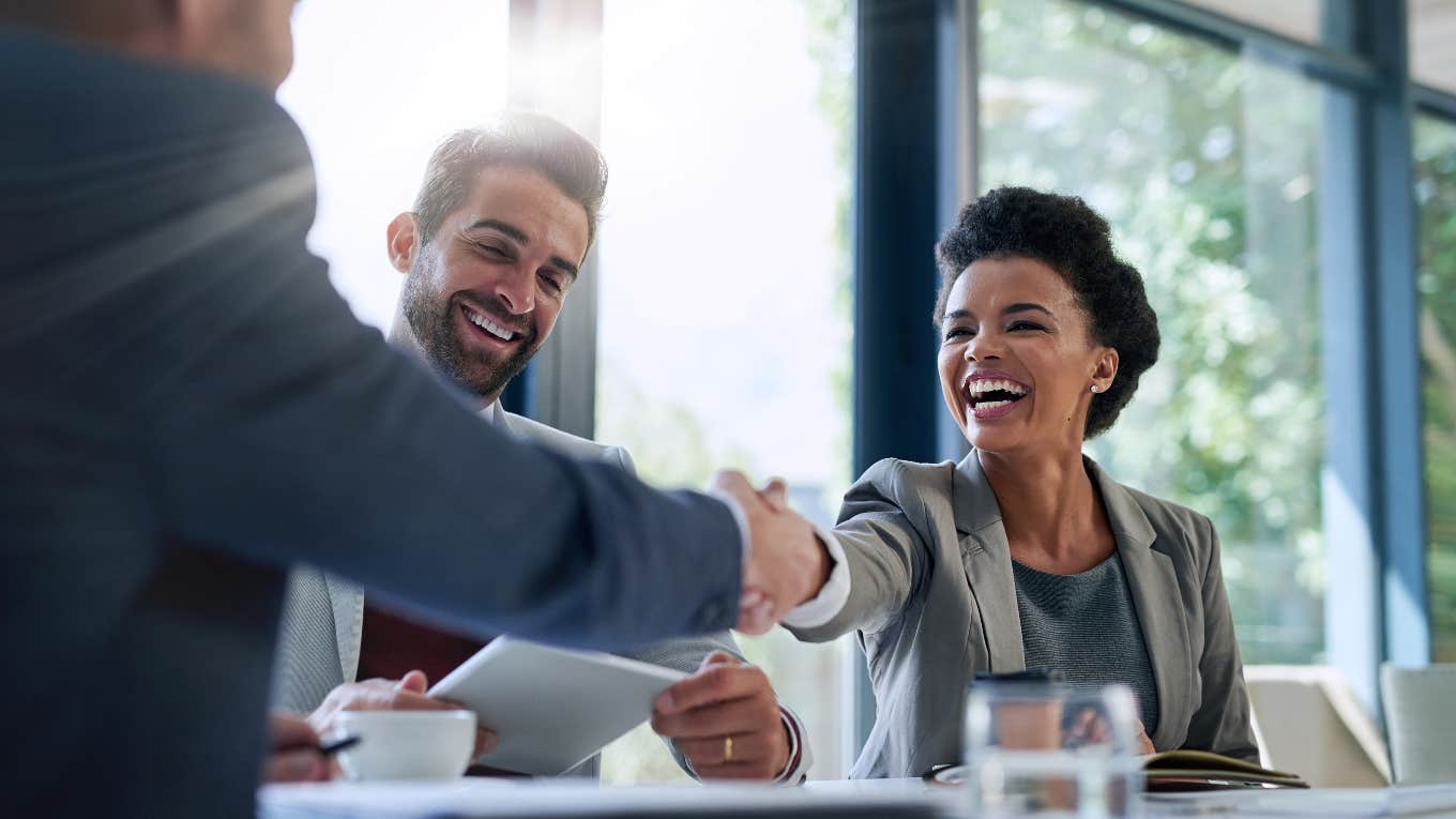 Shaking hands after a successful negotiation