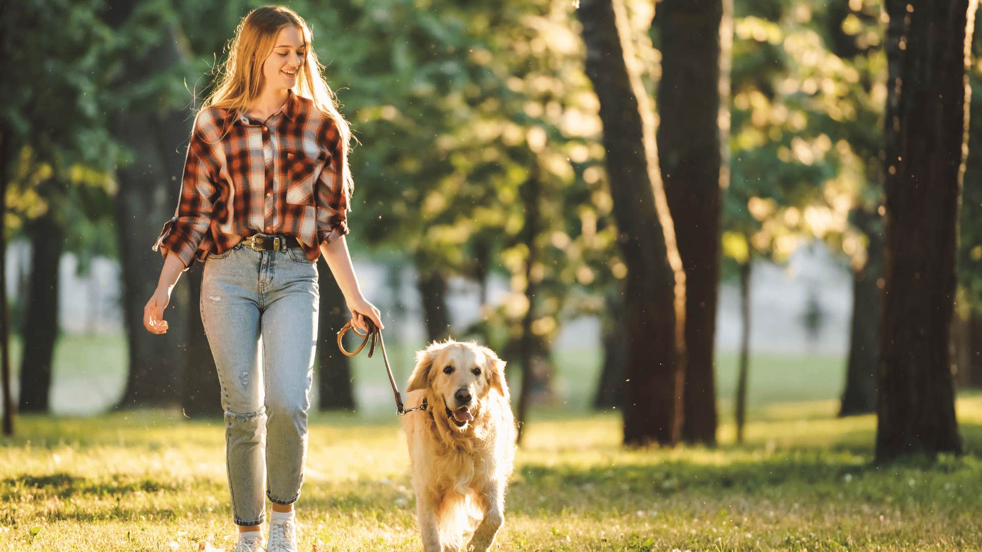 woman walking a dog