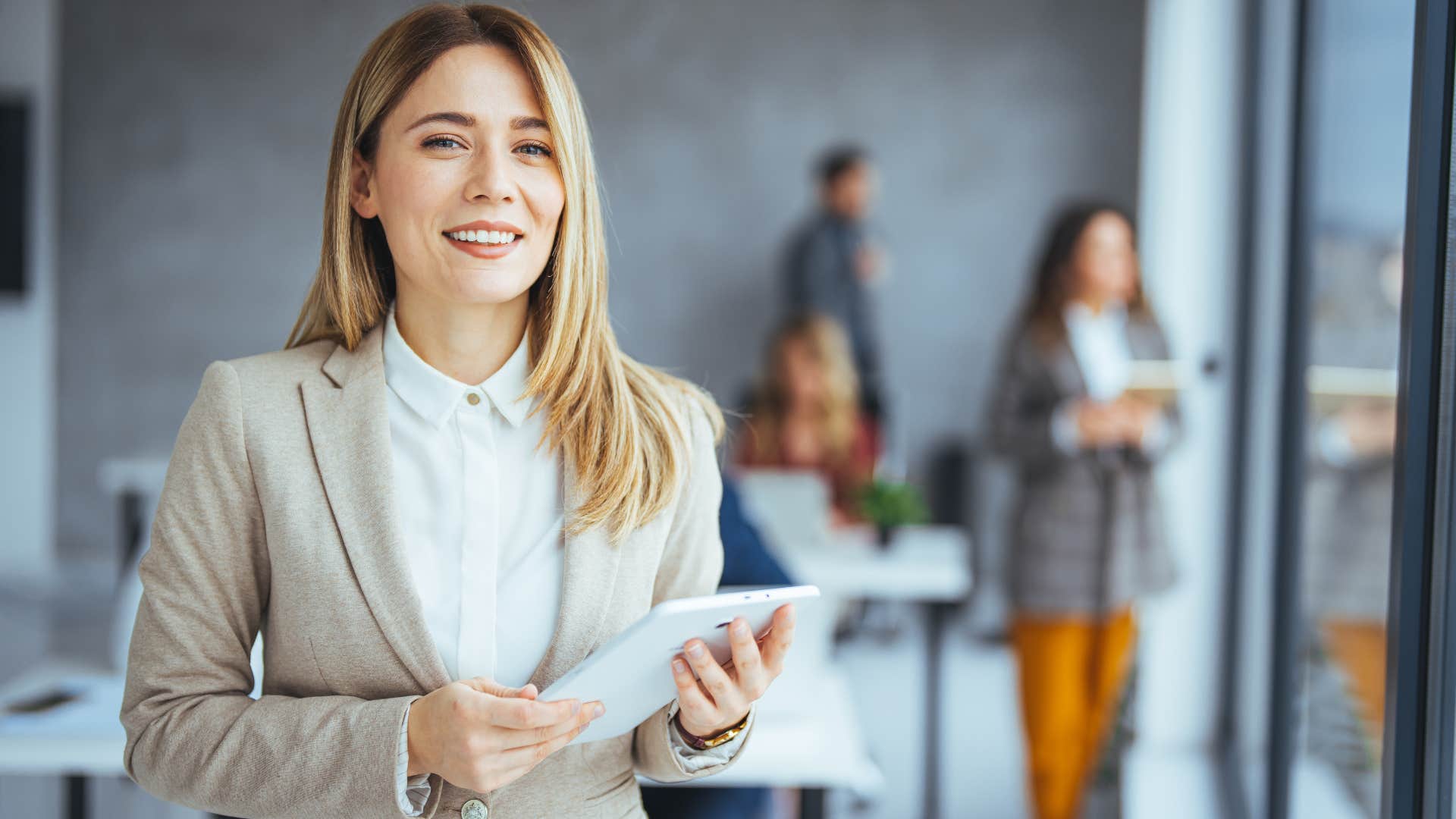 Woman smiling in her professional office.