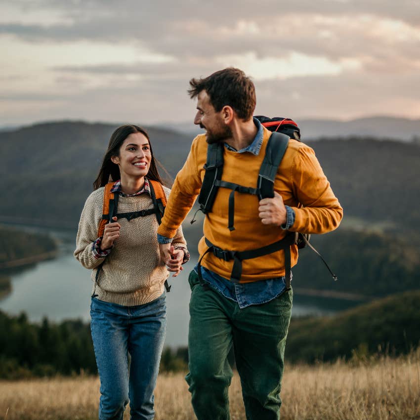 Couple who are retiring early hiking