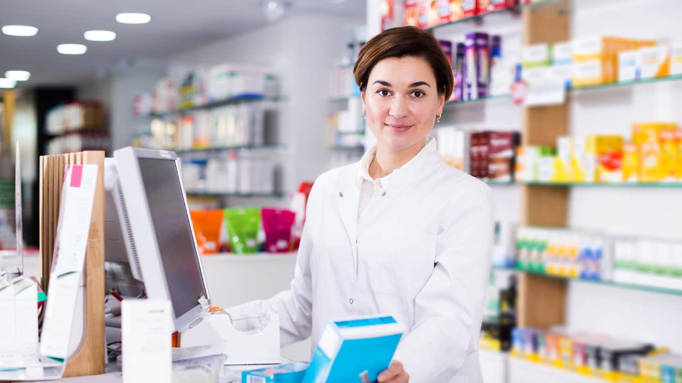 Walgreens worker at pharmacy register