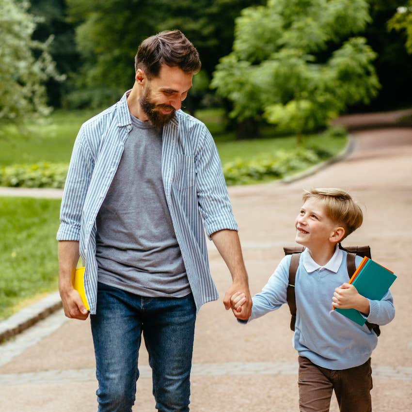 Dad who is a primary parent taking his son to school