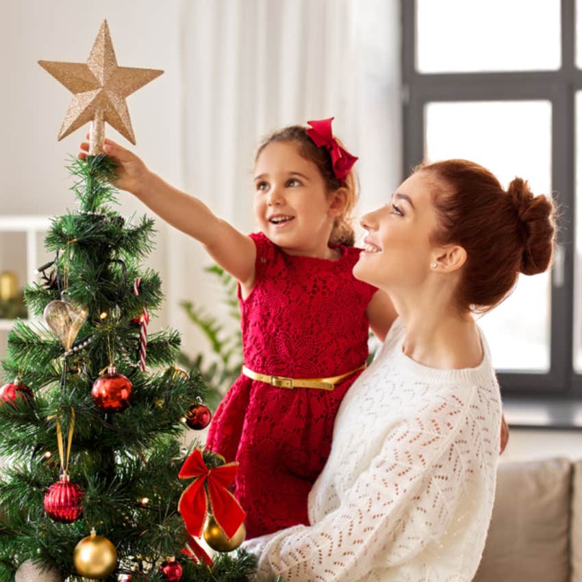 mom and daughter decorating for christmas 