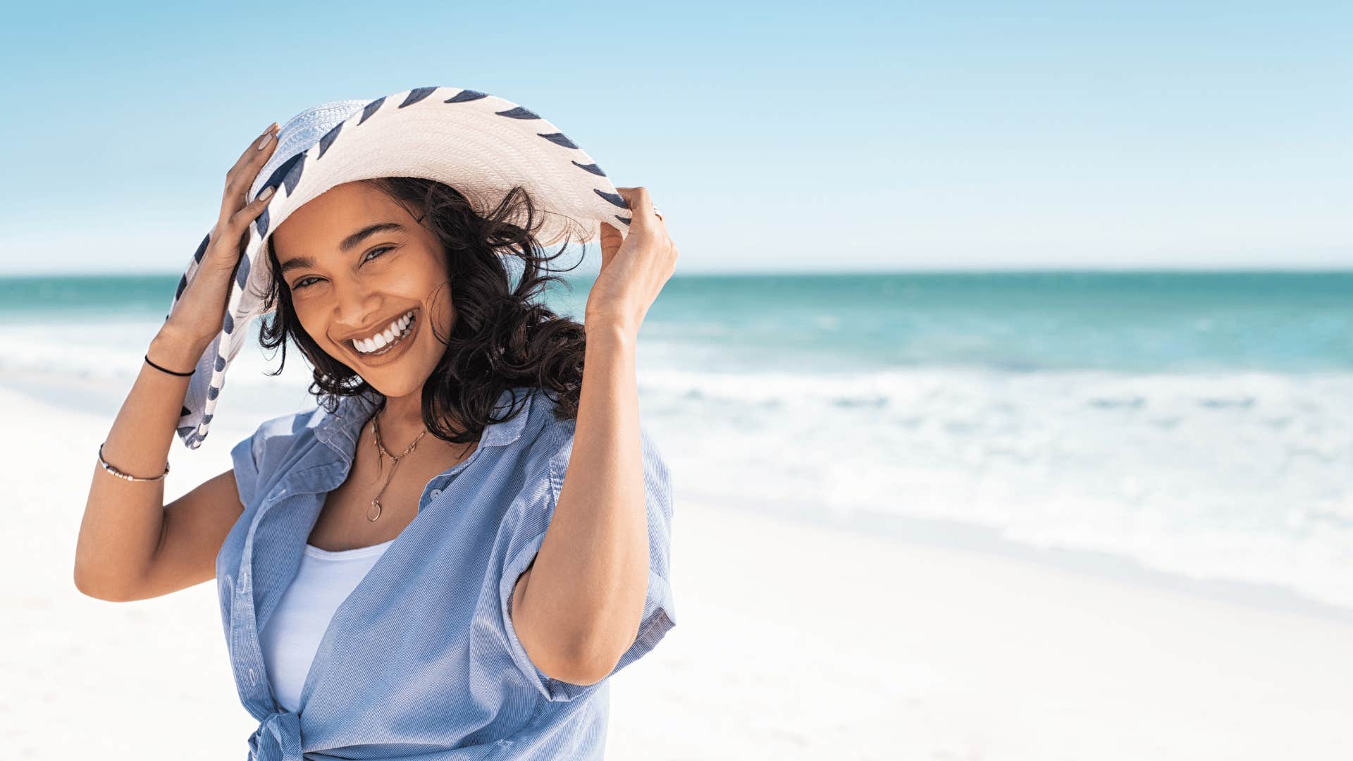 woman smiling on the beach