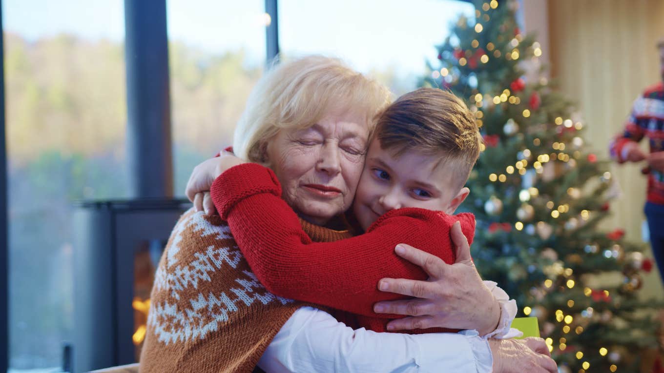 Estranged mom hugging grandkid