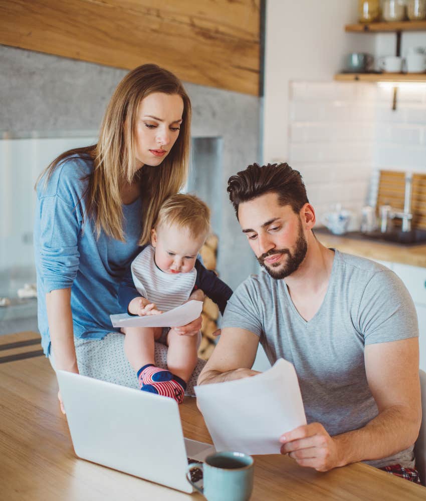 young family looking at budget