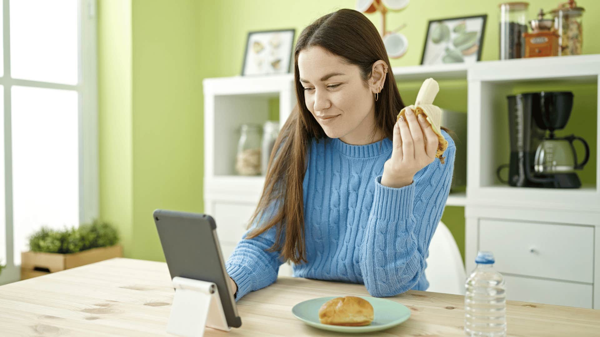 woman eating banana