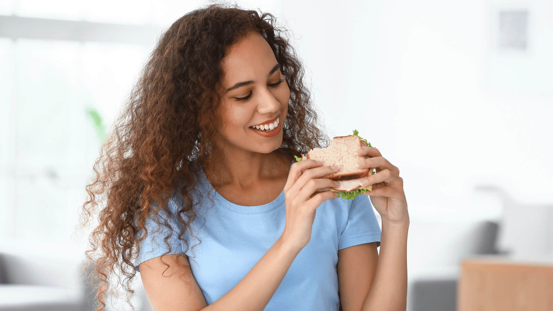 women eating sandwhich