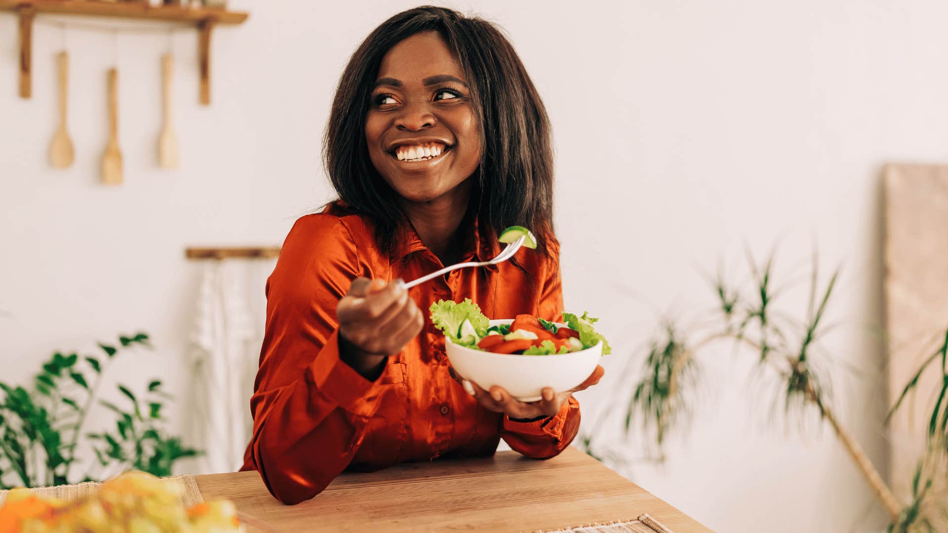 woman eating a salad