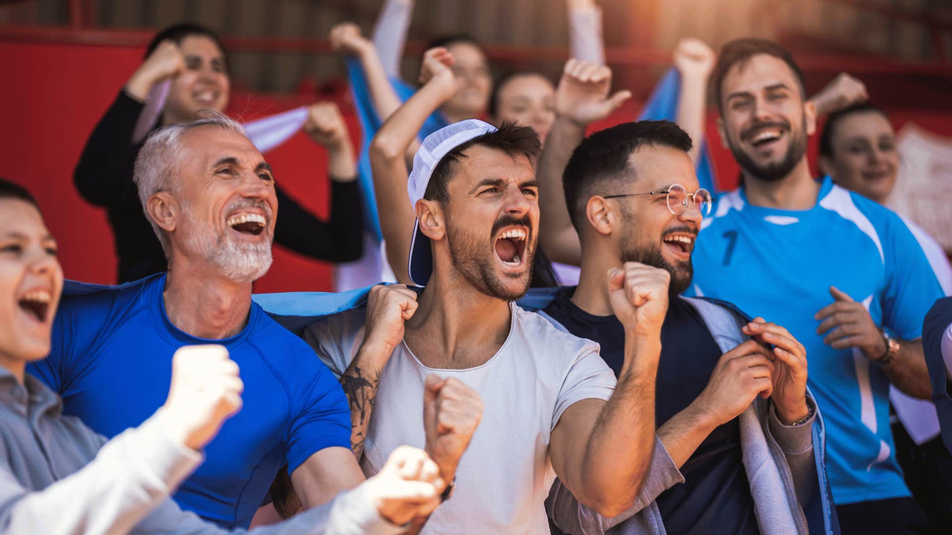 Man watching sports with friends he's afraid to lose if he doesn't stay together with partner