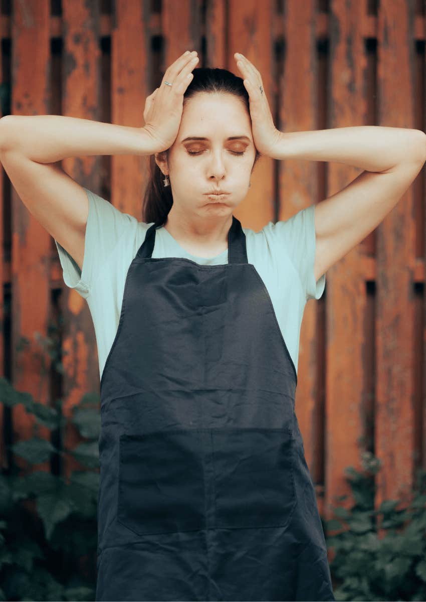 frustrated female employee standing outside