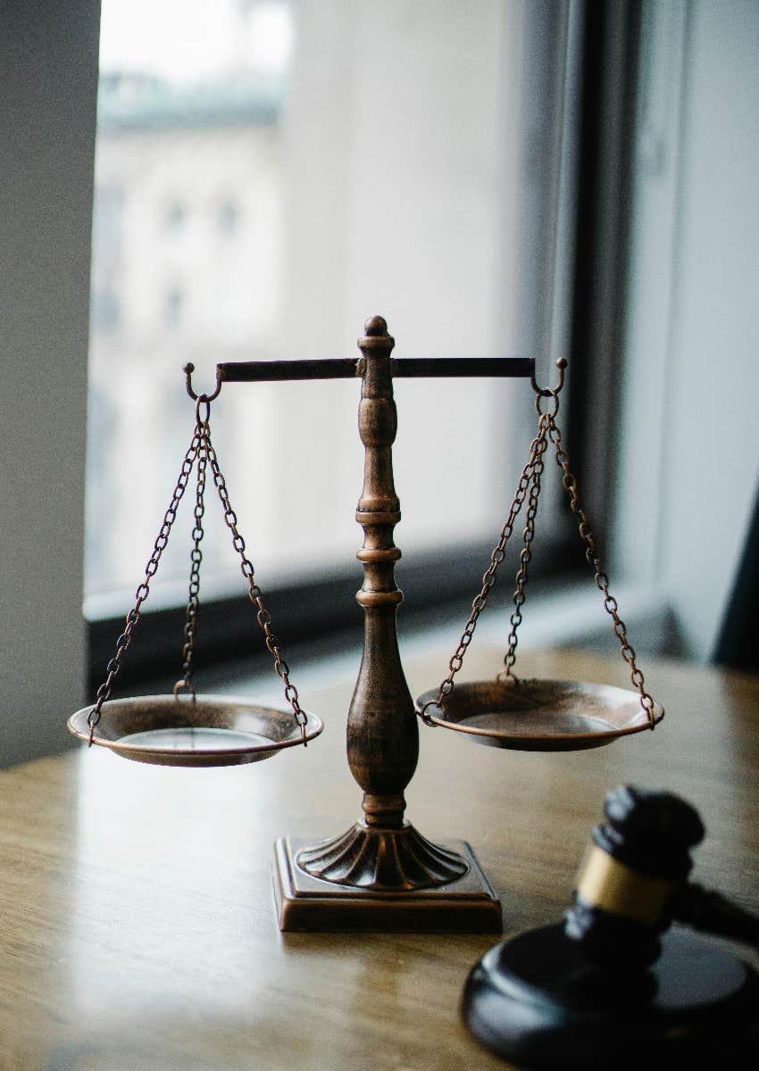 gavel and scales of justice on a desk