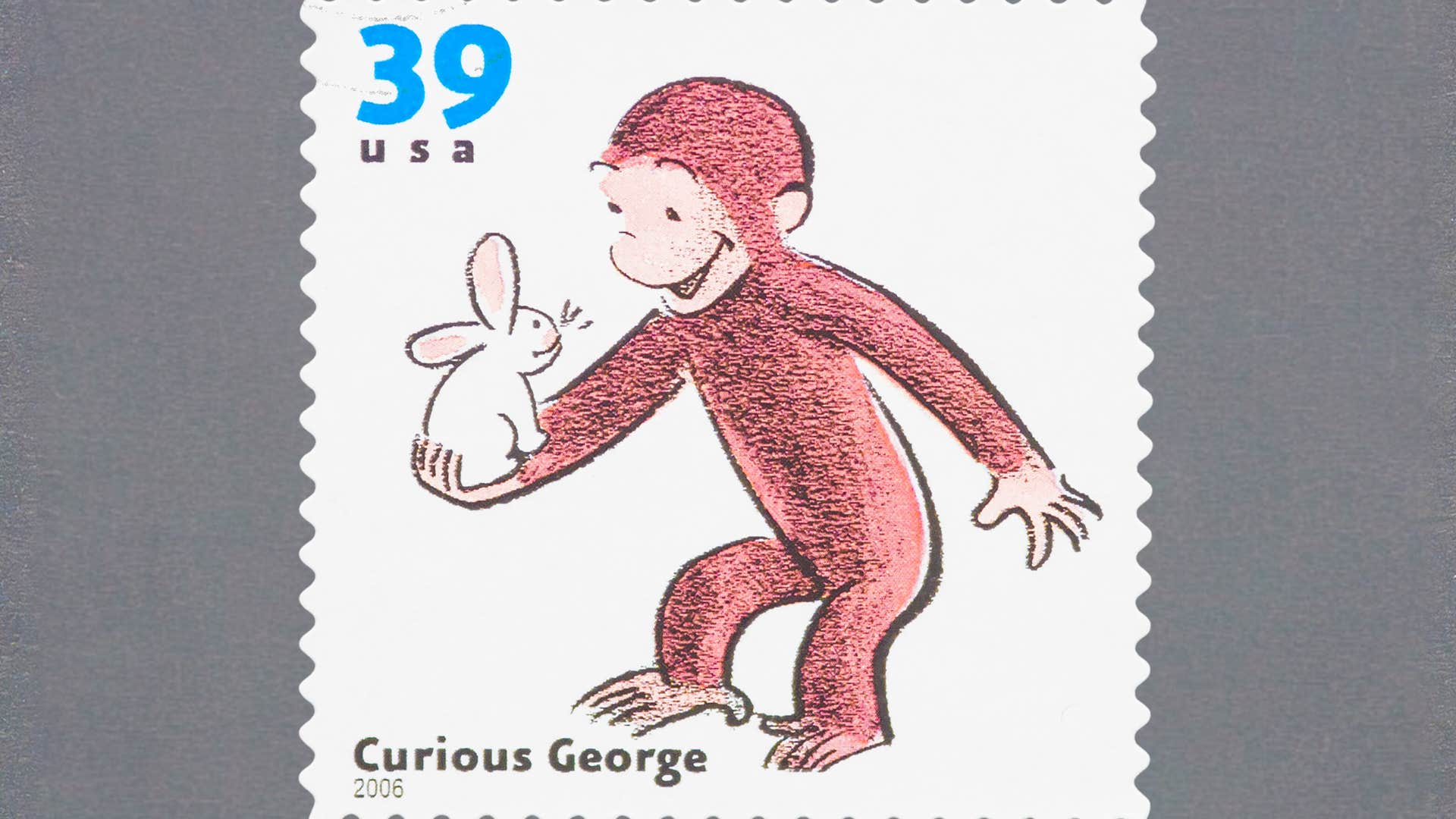 Curious George cartoon on a stamp