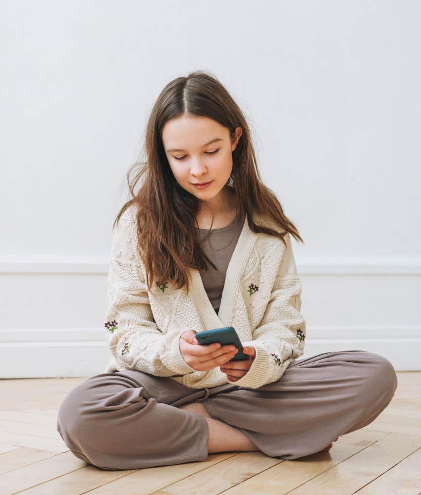 Gen Z teen staring at phone