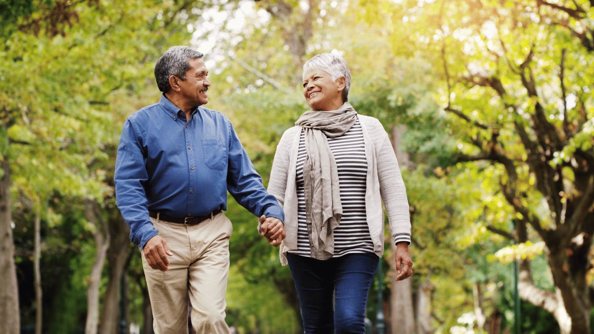 Grateful woman walks with confident man