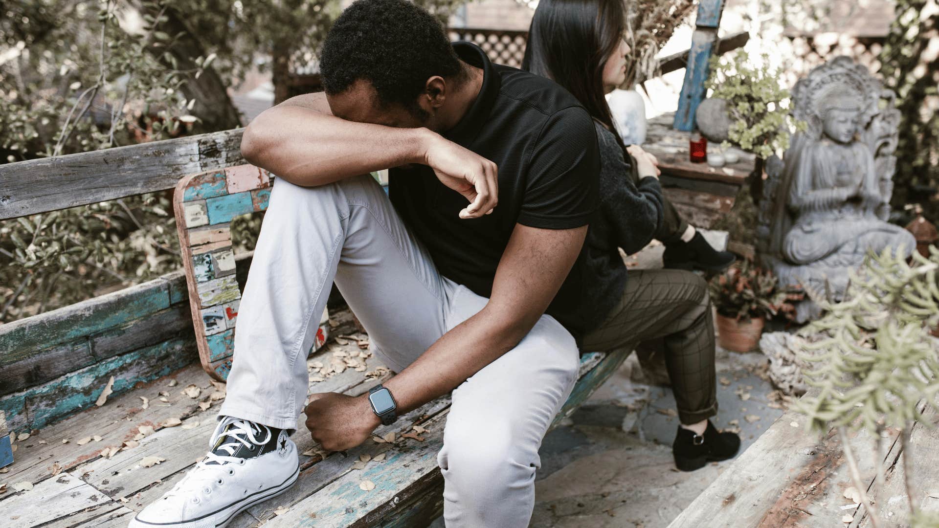 upset couples facing away from each other