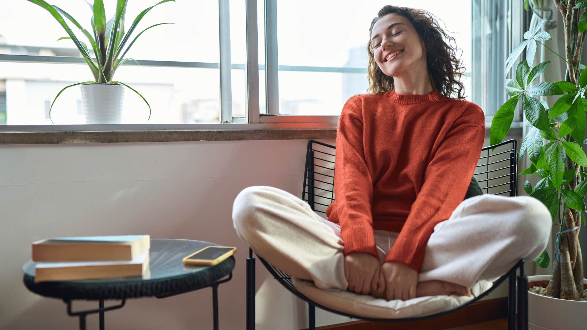 happy woman in apartment 