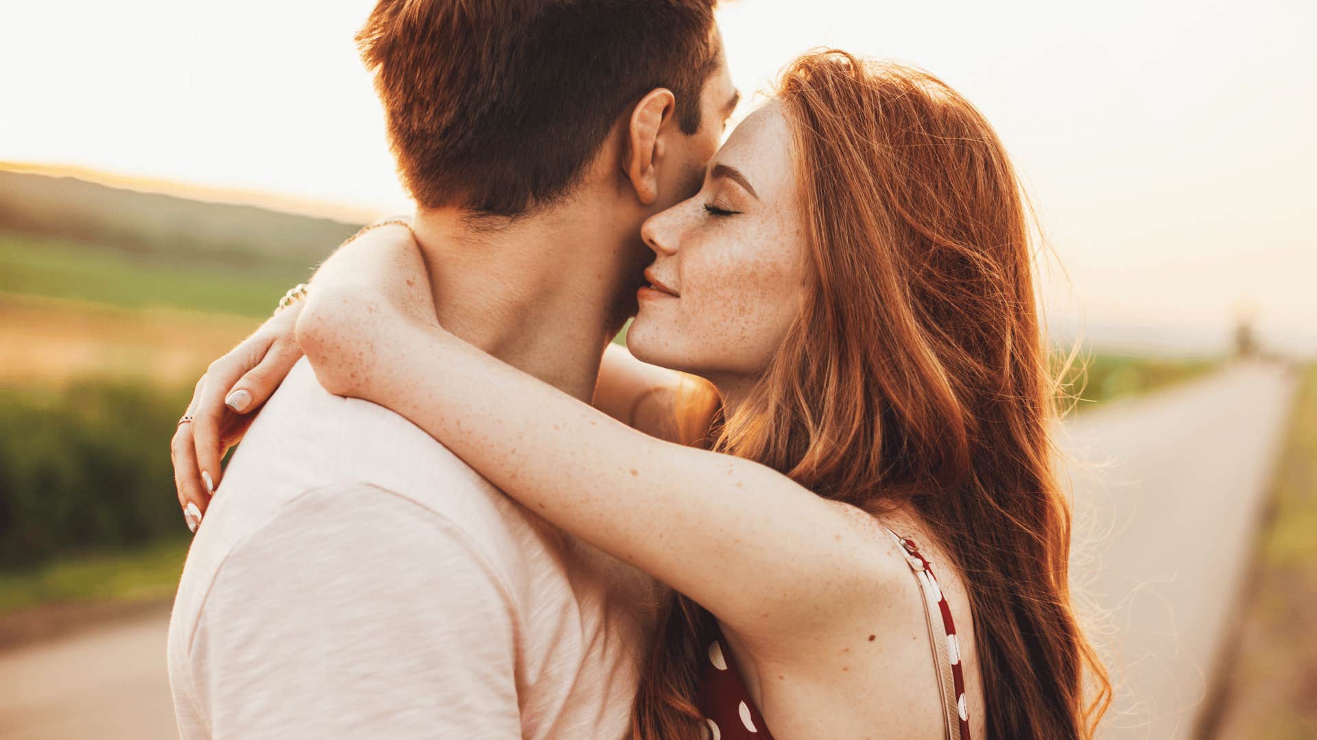  man and woman hugging