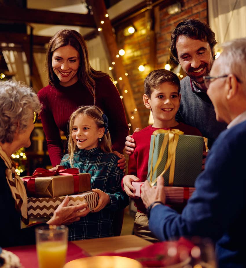 Family exchanges gifts together