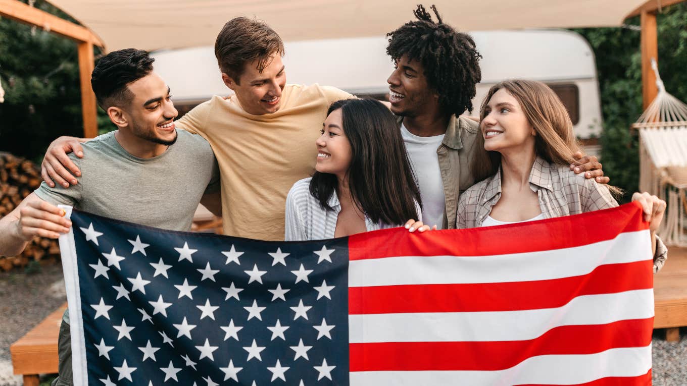 Friends holding the American flag