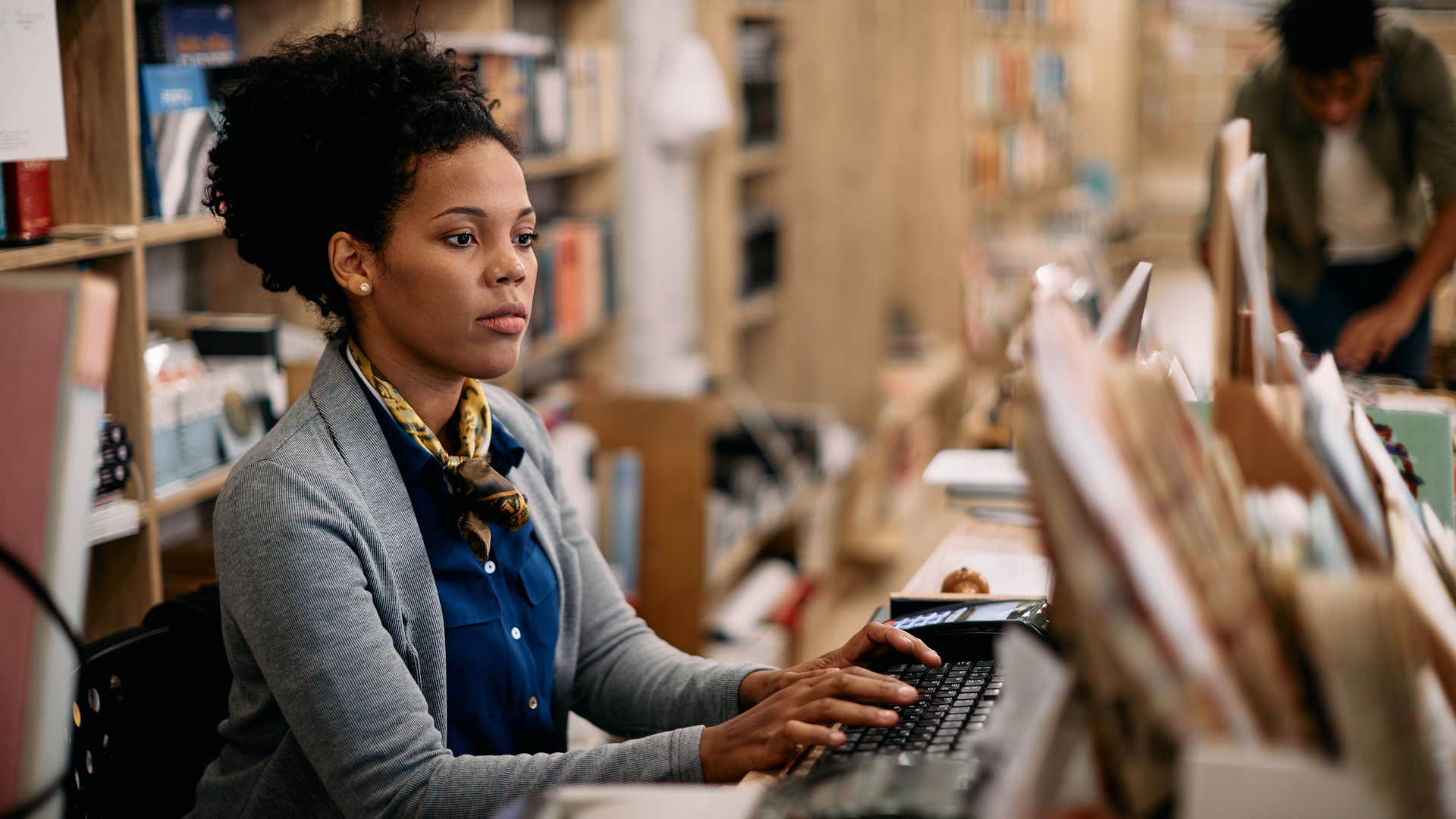 woman using a desktop computer