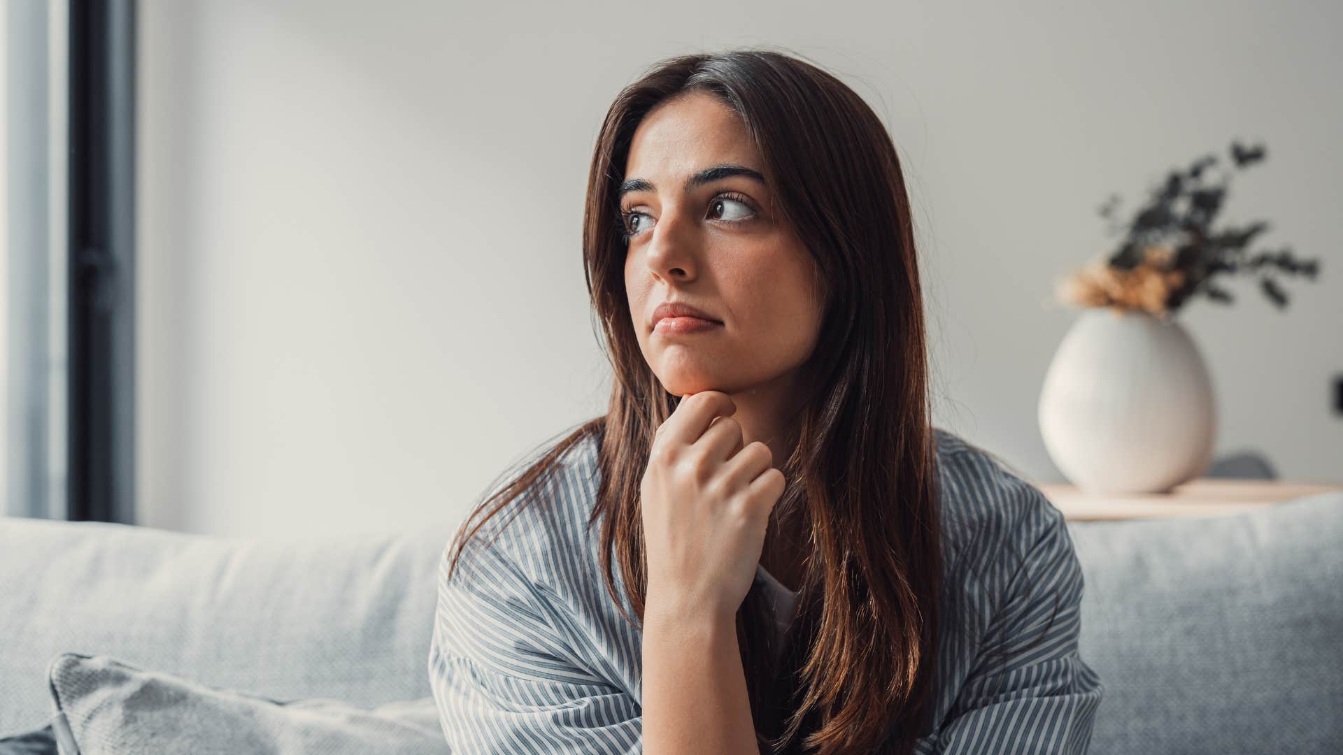 frustrated woman looking to the left