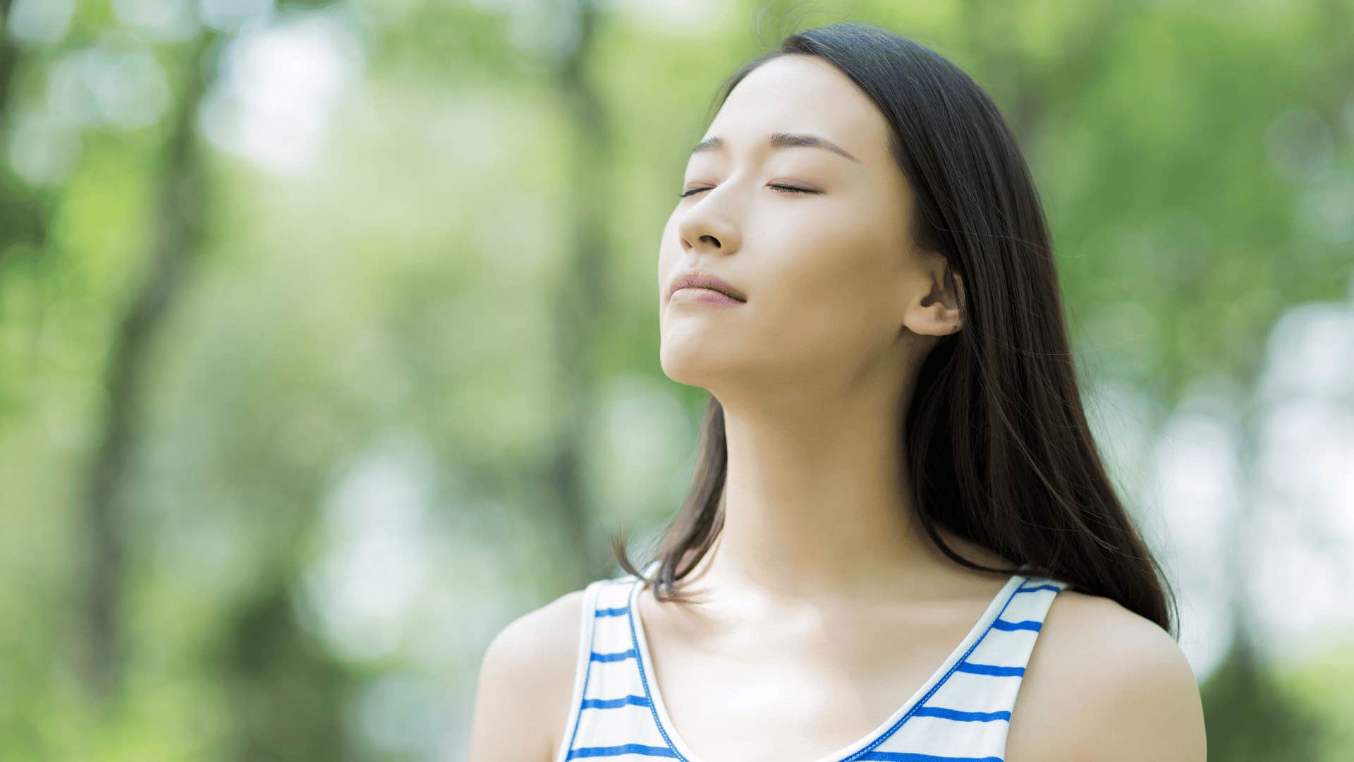 woman with her eyes closed