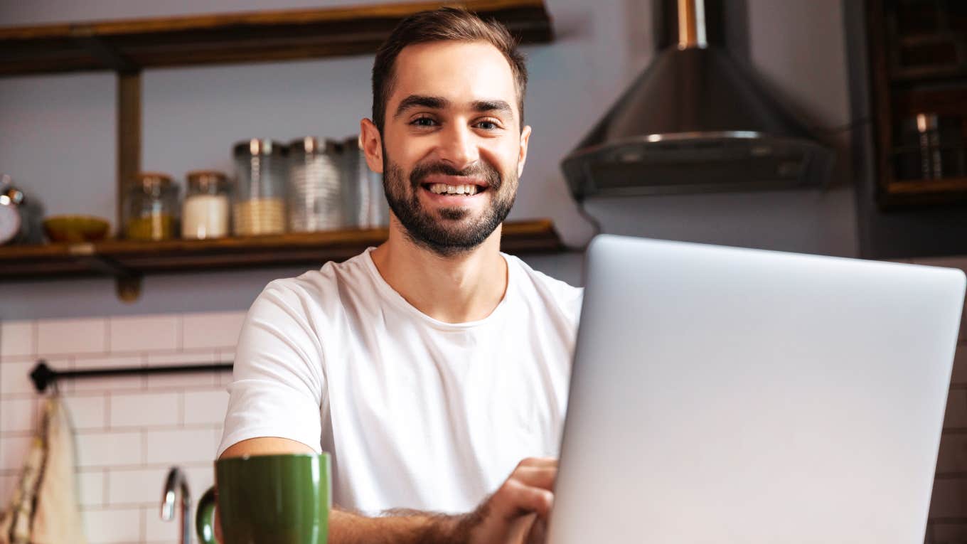 Happy man successfully making a LinkedIn post, and getting job offers