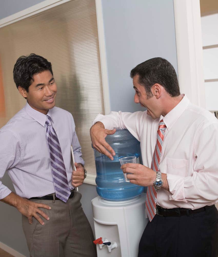 two men chatting at the work watercooler