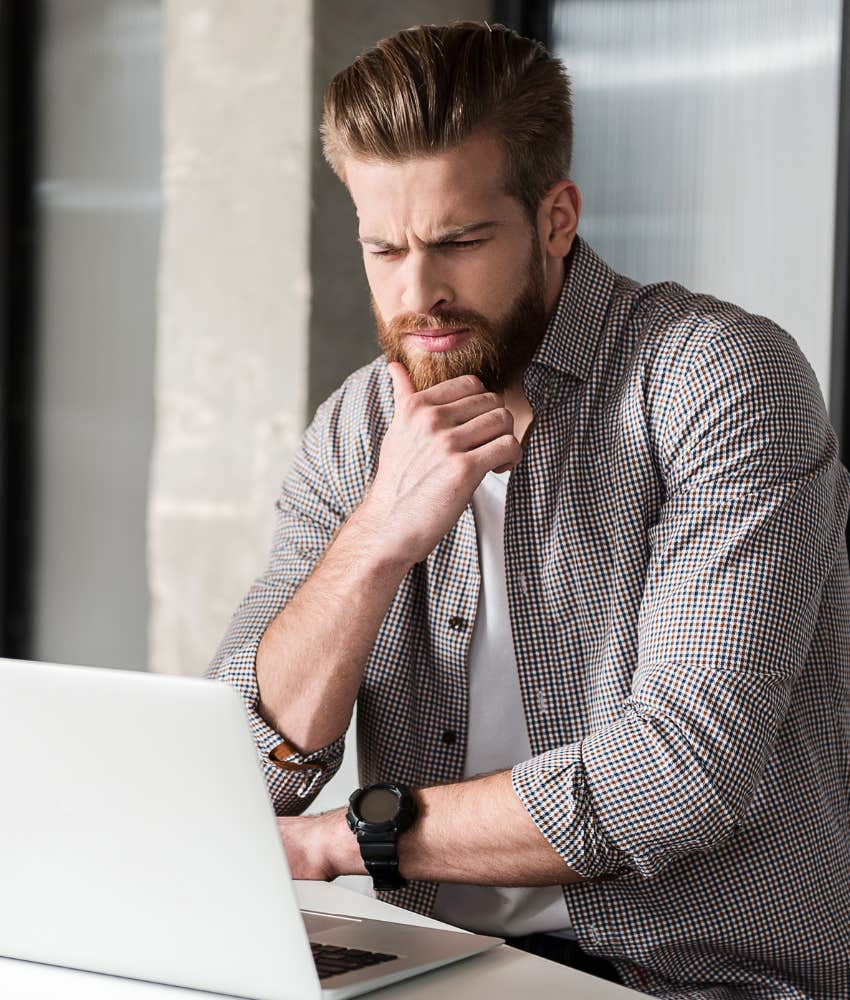 annoyed employee staring at computer